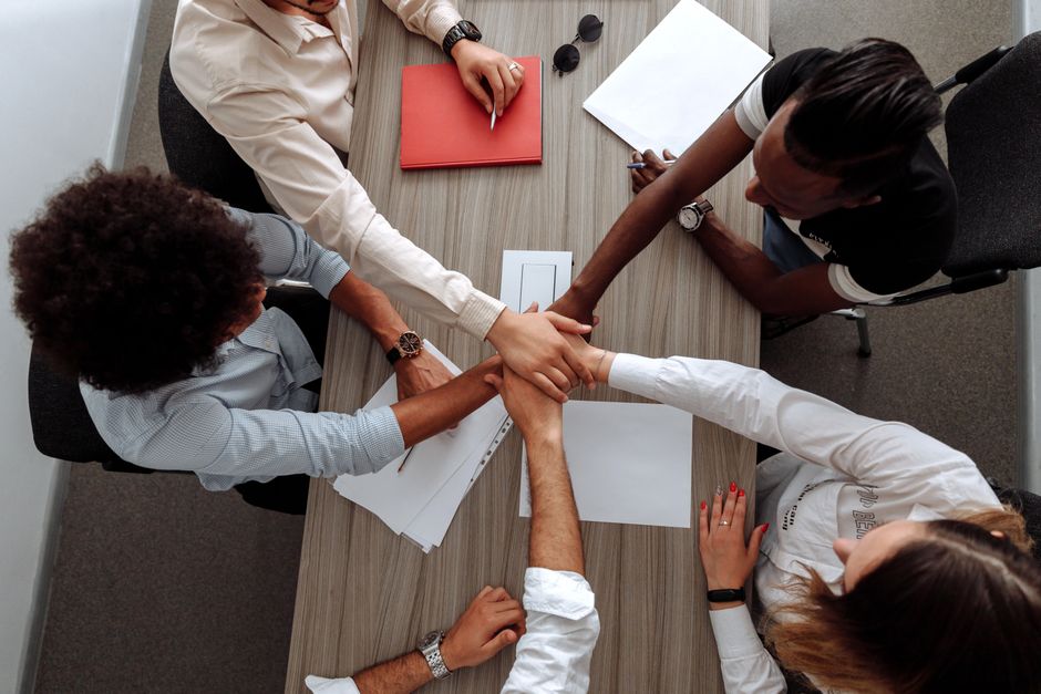 Team collaborating around a table